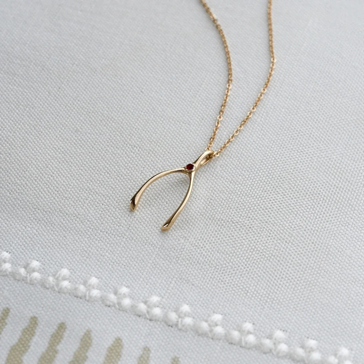 Small Garnet Wishbone Pendant in Solid 14k Gold (January) - Image 3