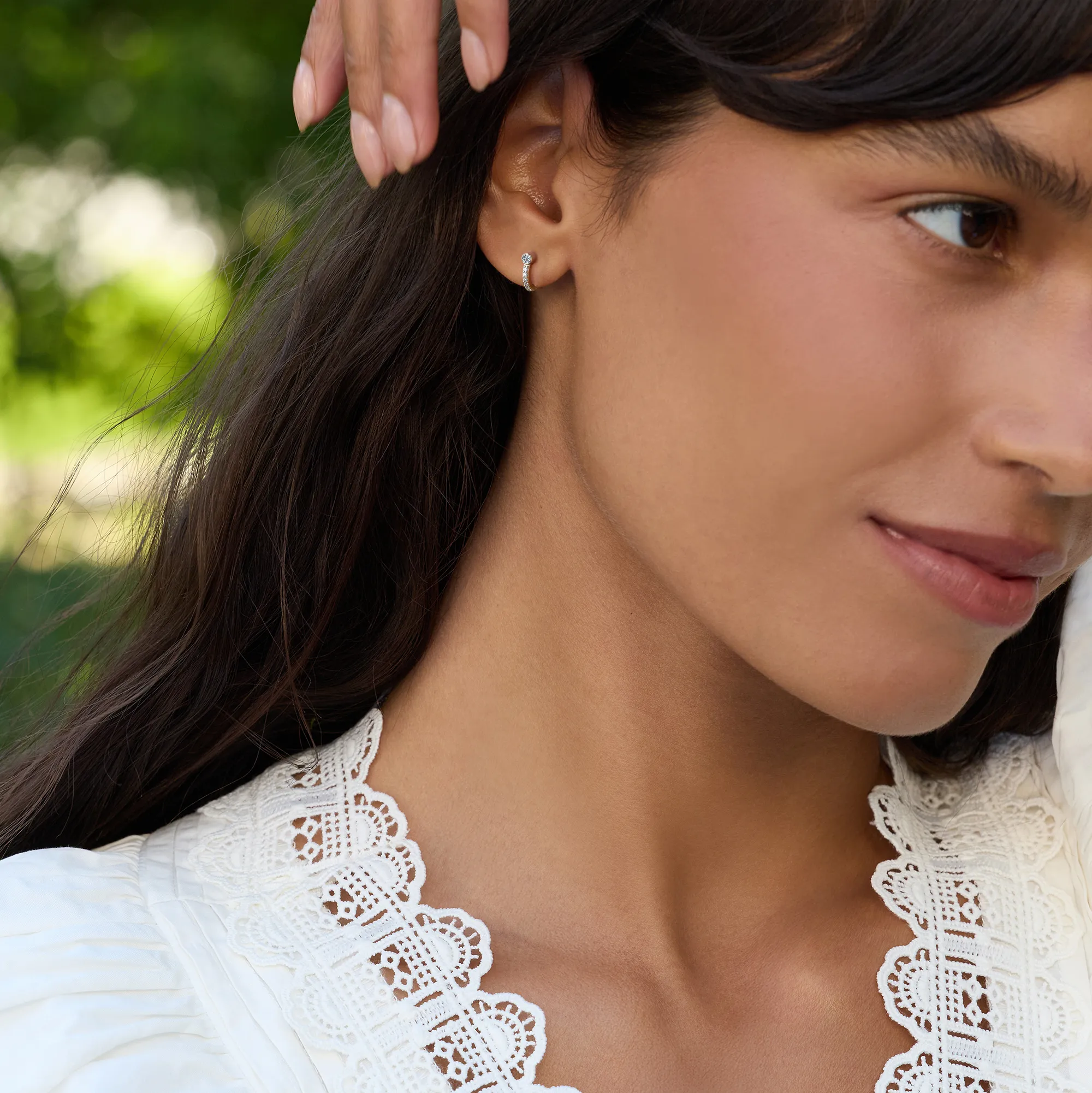 Tiny Birthstone Huggie Hoops with Diamonds in 14k Gold - Image 2
