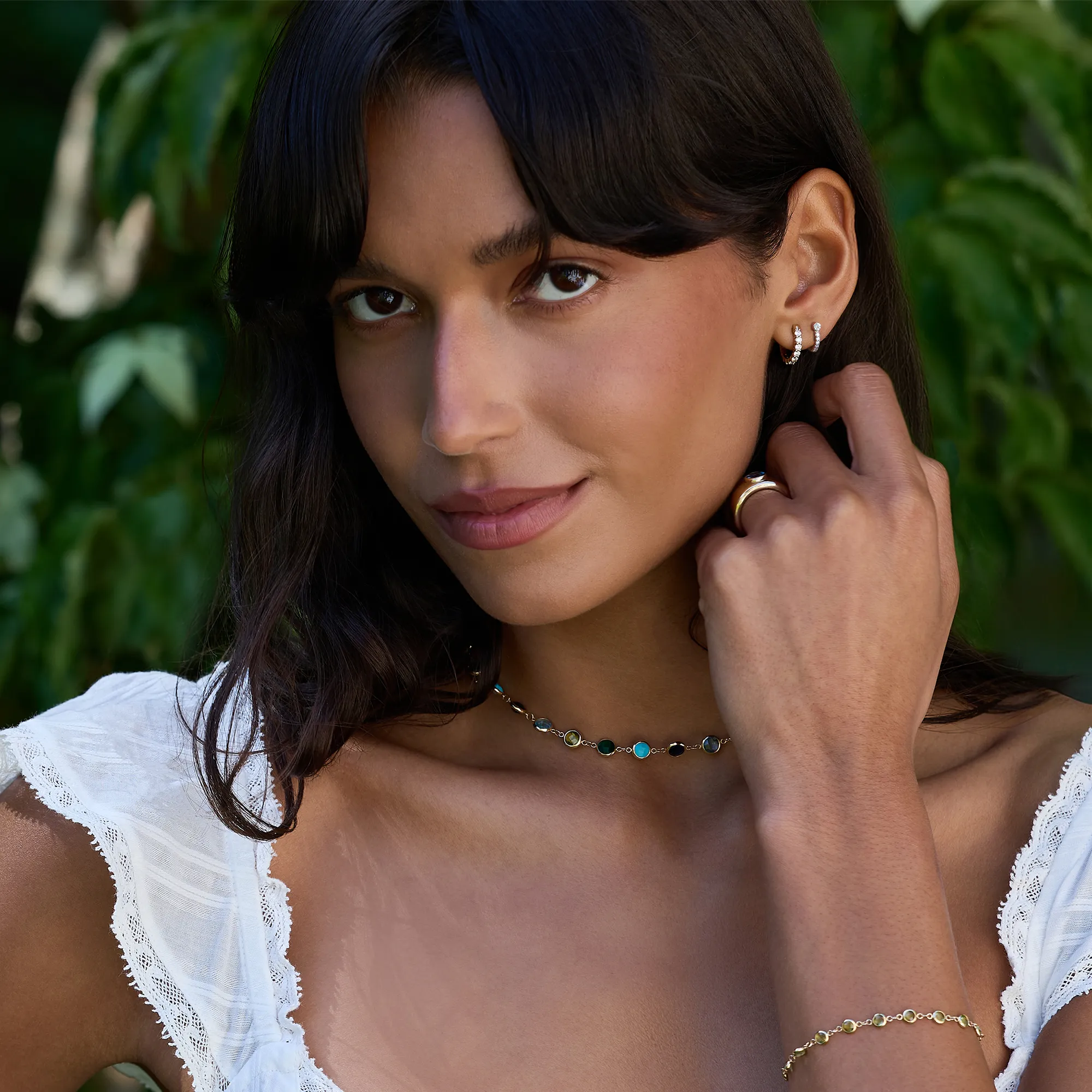 Tiny Birthstone Huggie Hoops with Diamonds in 14k Gold - Image 7