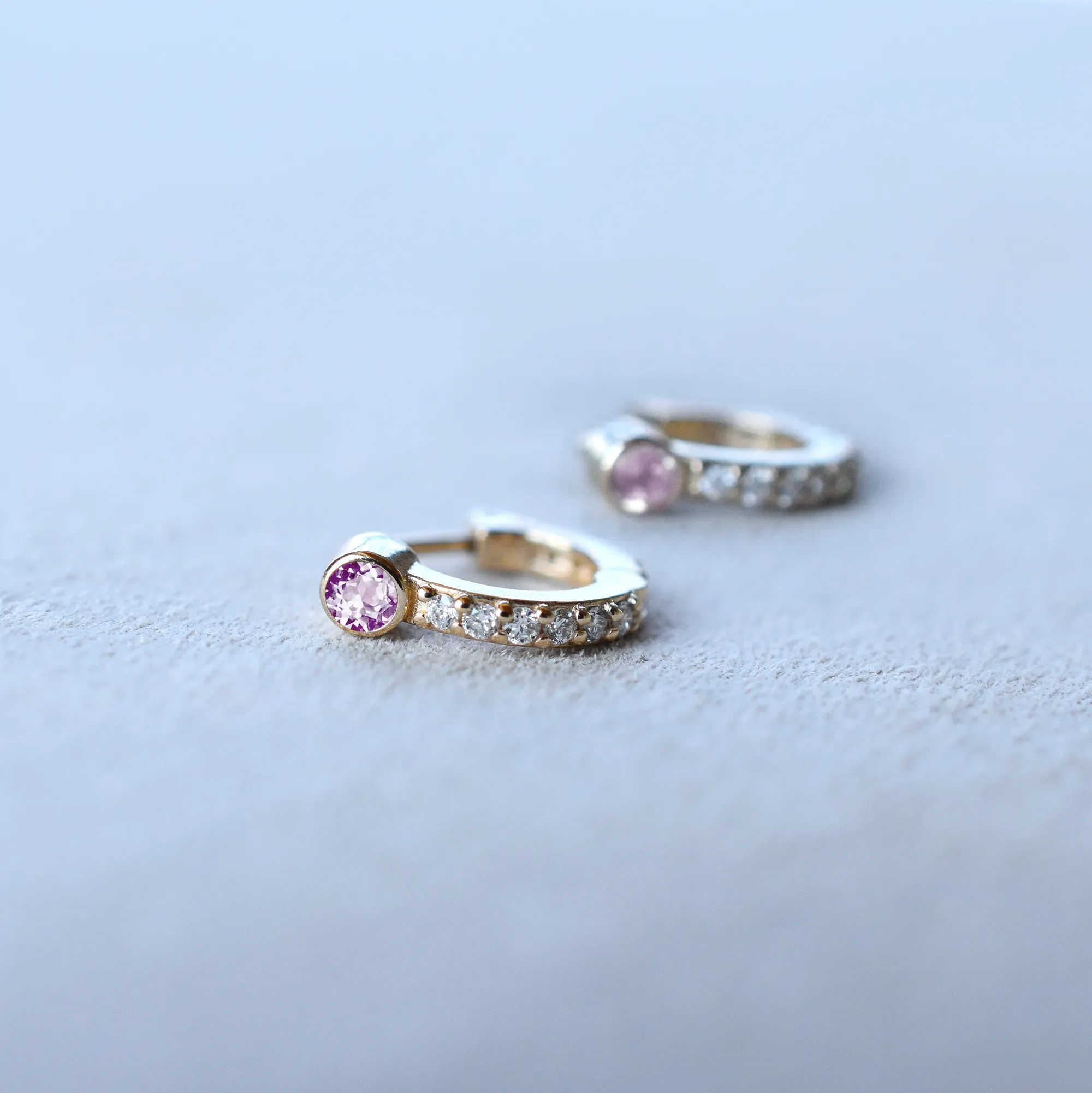 Tiny Pink Sapphire Huggie Hoops with Diamonds in 14k Gold (October) - Image 6